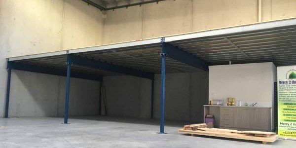 Structural mezzanine floor over toilet block