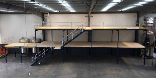 Two level structural mezzanine floor side