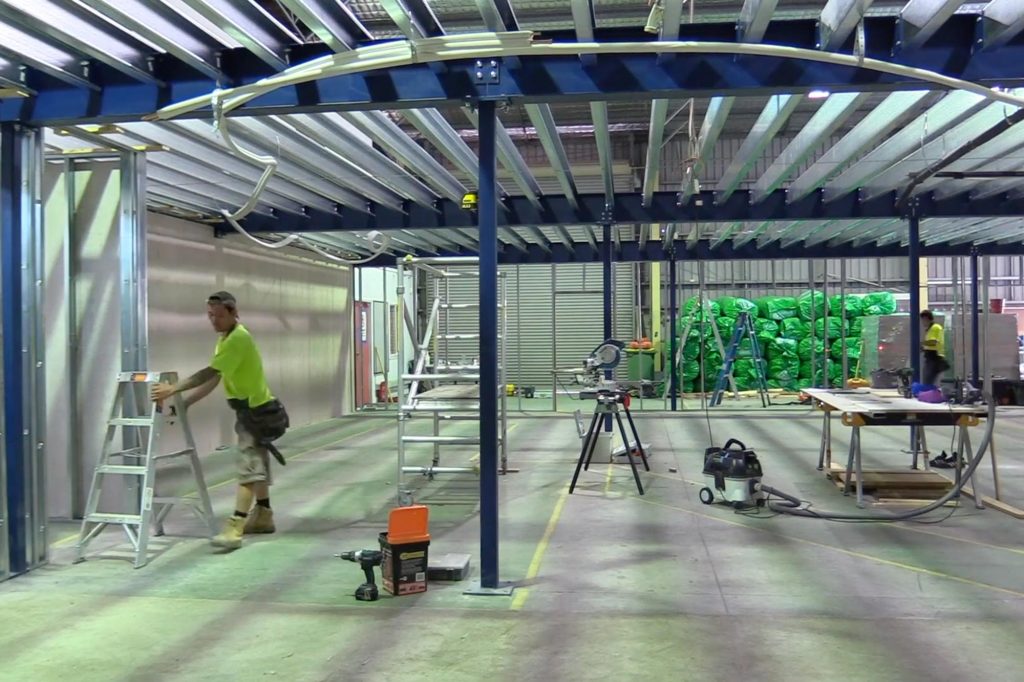 ConnectAbility Mezzanine Floor Worker Installing electrical