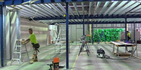 ConnectAbility Mezzanine Floor Worker Installing electrical