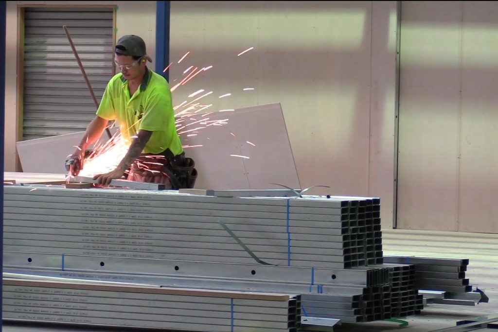 ConnectAbility Mezzanine Floor worker trimming purlin