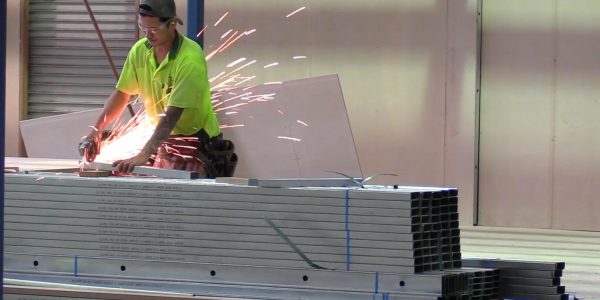 ConnectAbility Mezzanine Floor worker trimming purlin