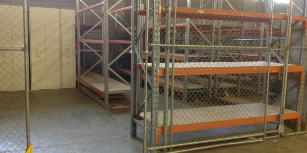 Longspan shelving with mesh and gate