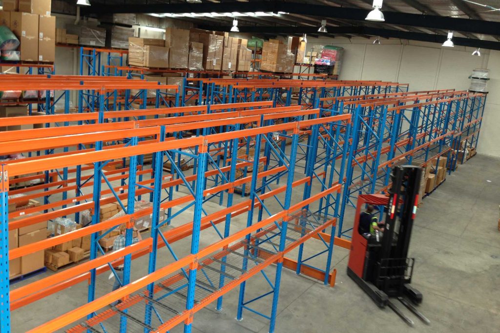 New installed selective pallet racking in warehouse with forklift