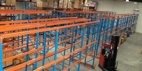 New installed selective pallet racking in warehouse with forklift