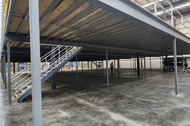 mezzanine floor with an industrial staircase